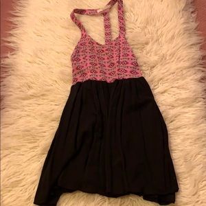 Sleeveless patter dress with cut out back details